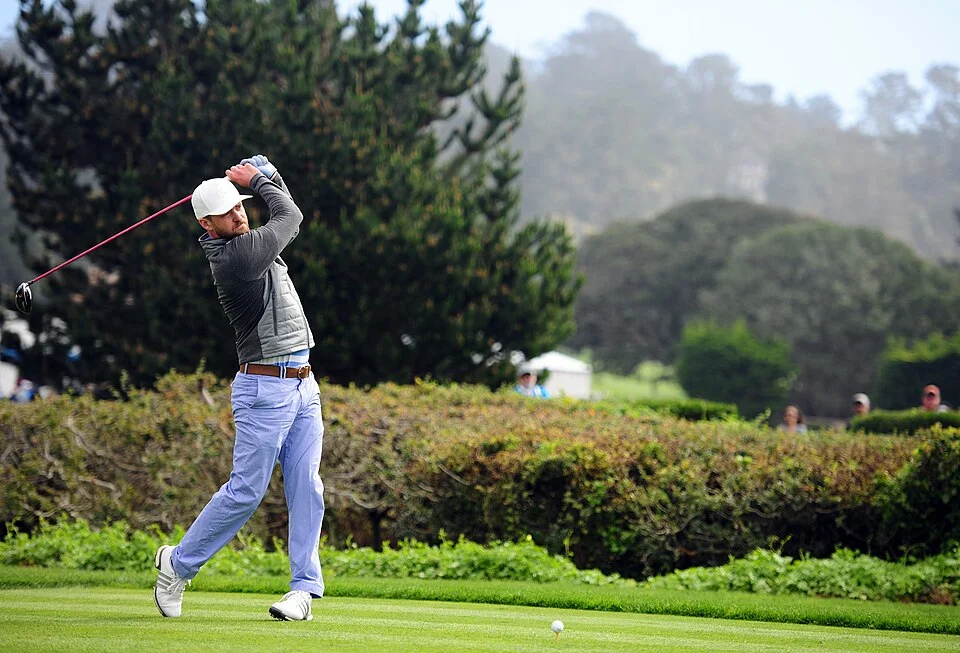 Justin Timberlake playing golf at celebrity tournament