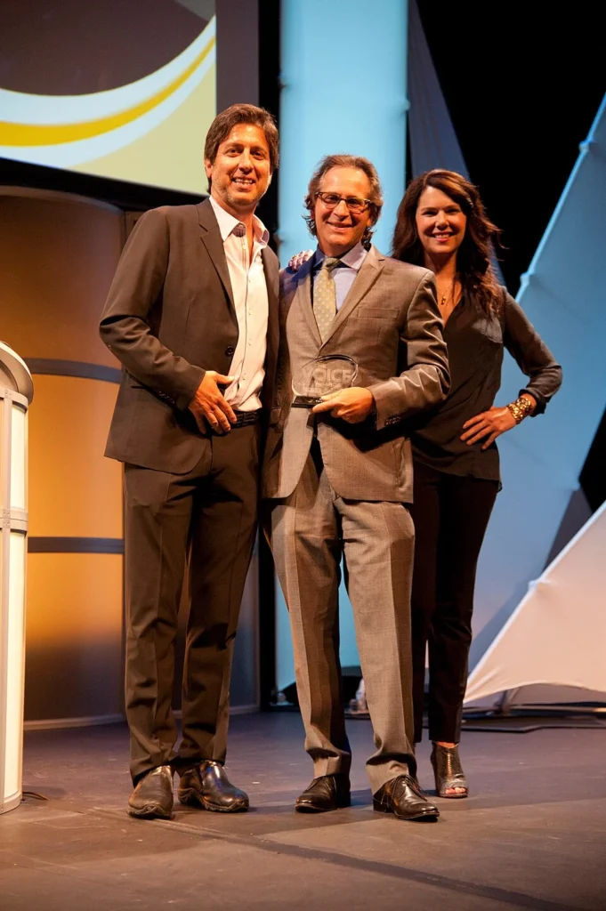 Ray Romano on stage at entertainment industry event