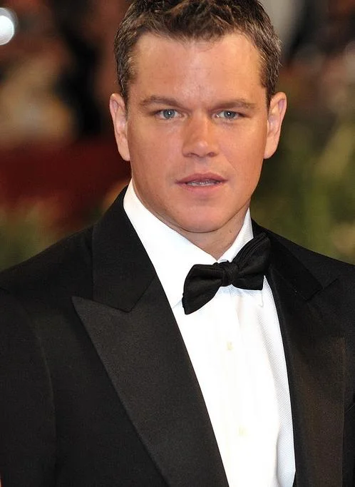 Matt Damon in black tuxedo at premiere event