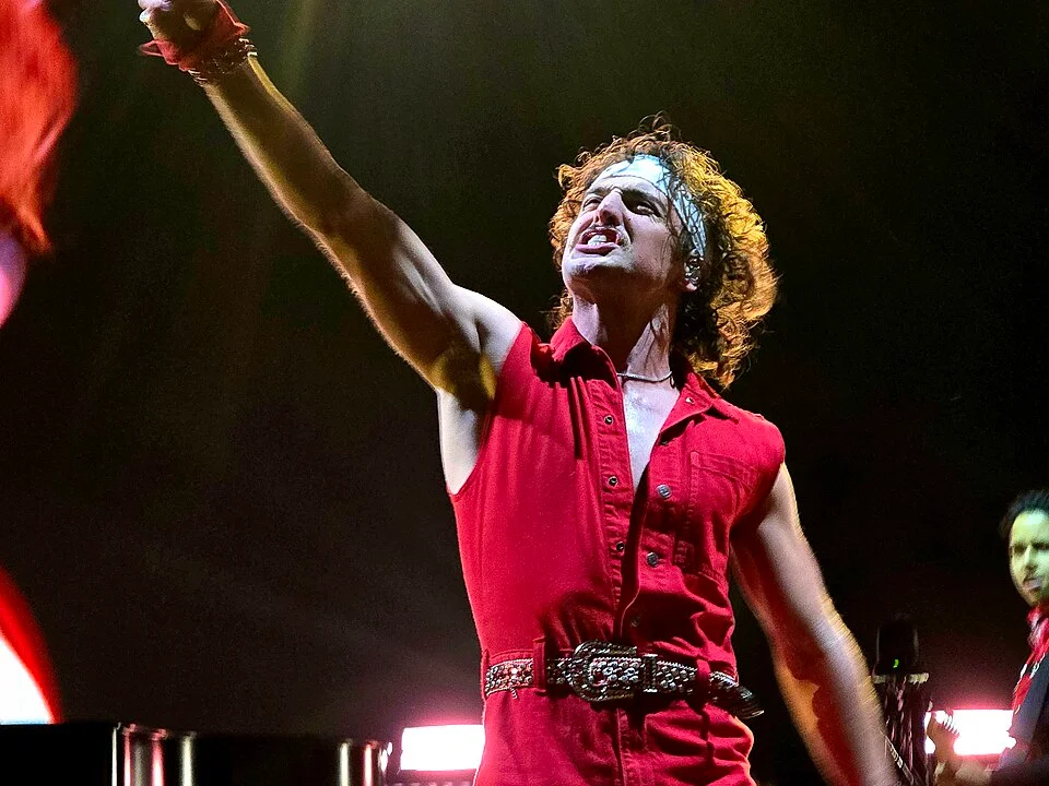 Benson Boone performing live on stage during his 2025 tour