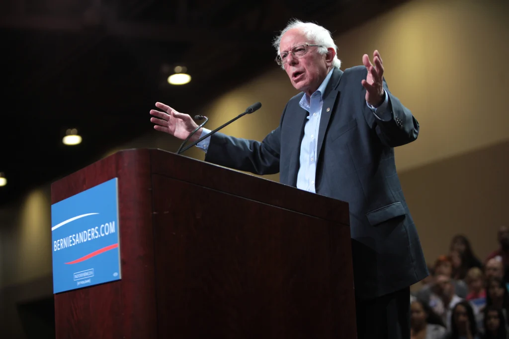 Bernie Sanders speaking at podium during campaign event
