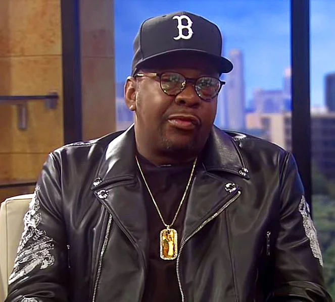 Bobby Brown wearing black leather jacket and cap during 2026 interview