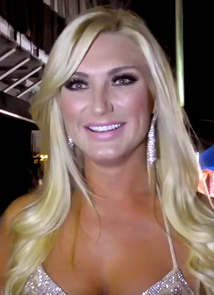 Brooke Hogan at red carpet event in sparkly dress