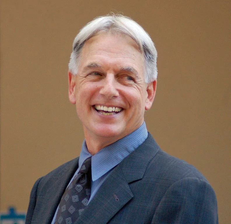 Mark Harmon, NCIS star, smiling in a suit