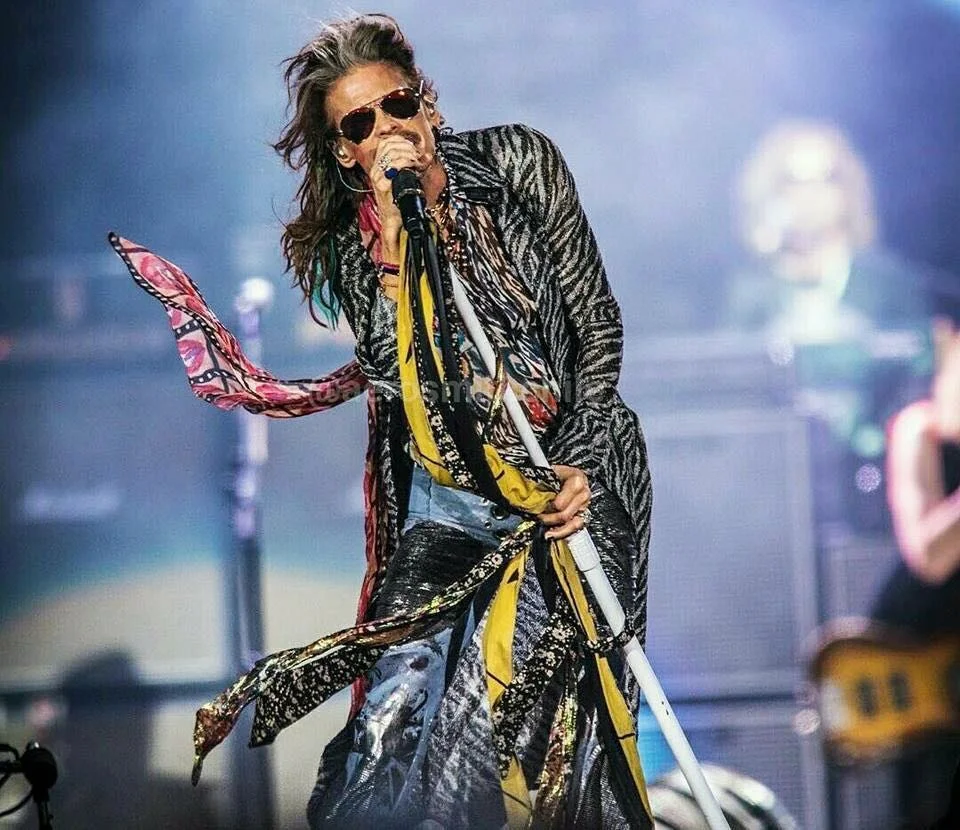 Steven Tyler performing live on stage with Aerosmith during their 2018 concert tour