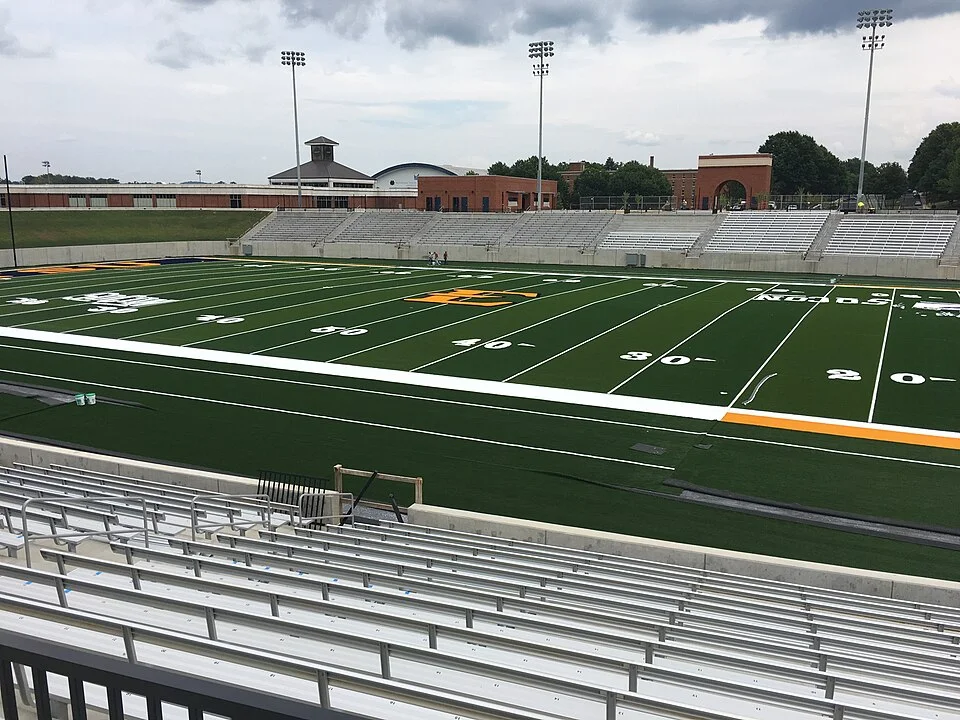 Empty college football stadium field, setting for Chad Powers season 2